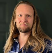 Dan, smiling
